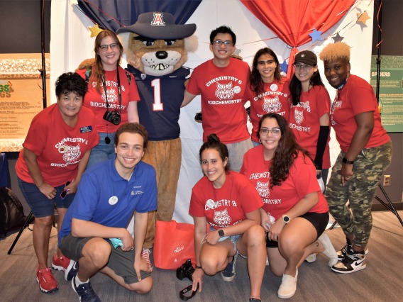 Chemistry & Biochemistry students and advisors pose with Wilbur Wildcat