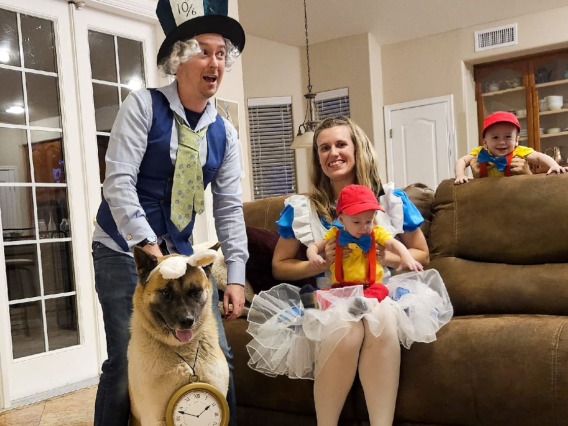Alice in Wonderland Family – Carleen De Armon as Alice, husband as Mad Hatter, Dog as Rabbit, and baby as Tweedle Dee or Tweedle Dum