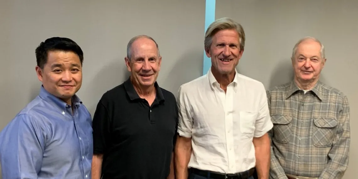 Using Computational Chemistry to Produce Cheaper Infrared Plastic Lenses Photo of Jeff Pyun, Dennis Lichtenberger, Robert Norwood and Richard Glass